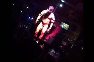 Dark-hued guy stripper dancing at go